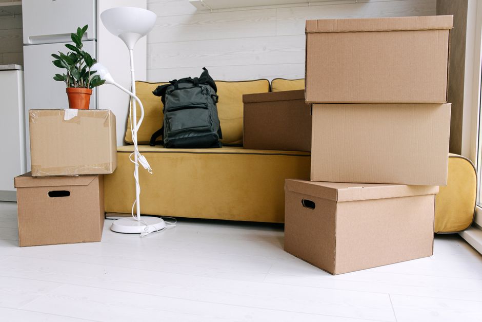 Packed boxes staged in a living room on moving day
